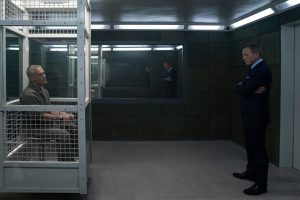 James Bond (Daniel Craig) visits Blofeld (Christoph Waltz) in his prison cell in NO TIME TO DIE